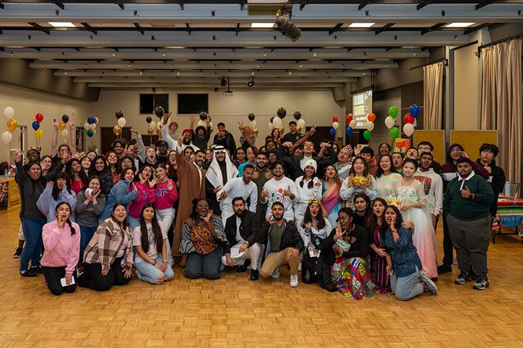 Students pose in a group during Global Groove